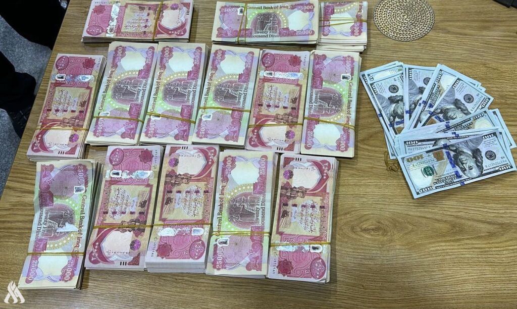 ضبط عملة مزورة بحوزة مسافرة أجنبية وافد إلى العراق عبر منفذ القائم